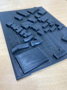 3D printed map with raised sections to indicate buildings